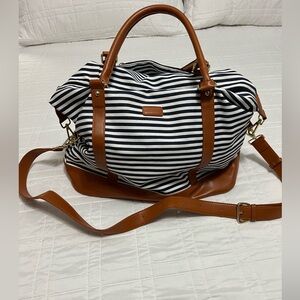 Navy blue & white striped overnight bag. Never used.